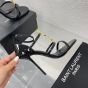 YSL Cassandra sandals in patent leather