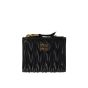 MIU MIU Small wallet in matelassé nappa leather