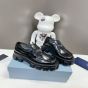 Prada Monolith patent leather loafers