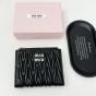 MIU MIU Small wallet in matelassé nappa leather