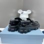 Prada Monolith patent leather loafers