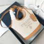 Prada Linen blend and leather mini-buckle bag