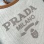 Prada Linen blend and leather mini-buckle bag
