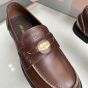 MIU MIU Vintage-effect leather penny loafers