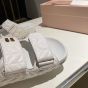 MIU MIU Matelassé nappa leather slides
