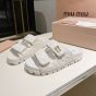 MIU MIU Matelassé nappa leather slides