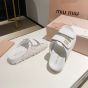 MIU MIU Matelassé nappa leather slides