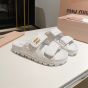 MIU MIU Matelassé nappa leather slides