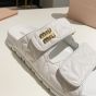 MIU MIU Matelassé nappa leather slides