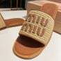 MIU MIU Raffia-effect woven fabric slides