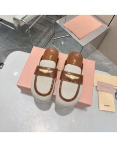 MIU MIU Canvas and leather mules