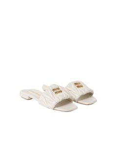 MIU MIU Matelassé nappa leather slides