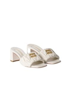 MIU MIU Matelassé nappa leather slides
