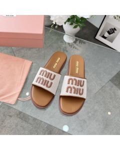 MIU MIU Canvas and leather slides