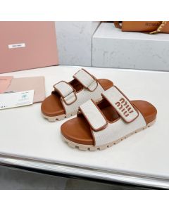 MIU MIU Canvas slides