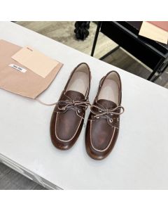 MIU MIU Unlined bleached leather boat shoes
