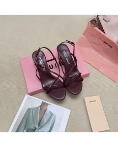 MIU MIU Patent leather sandals with buckles