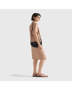 Prada Arqué leather shoulder bag with flap