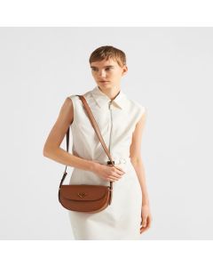 Prada Arqué leather shoulder bag with flap