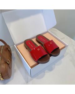 MIU MIU Patent leather clogs