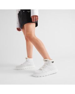 Prada Leather and shearling high-top sneakers