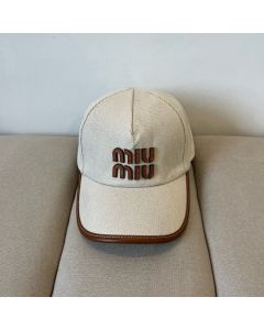 Miu Miu Canvas and leather baseball cap
