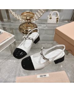 MIU MIU Two-tone patent leather slingback pumps