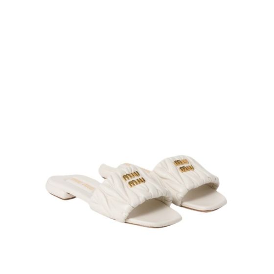 MIU MIU Matelassé nappa leather slides