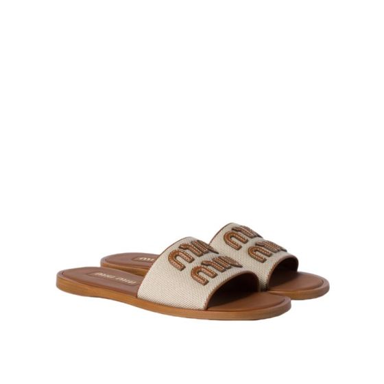 MIU MIU Canvas and leather slides