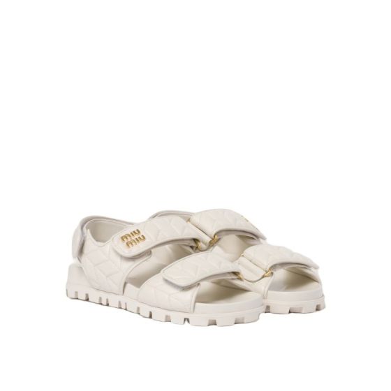 MIU MIU Matelassé nappa leather slides