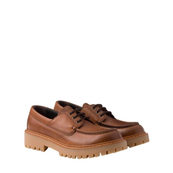 Prada Laced leather loafers