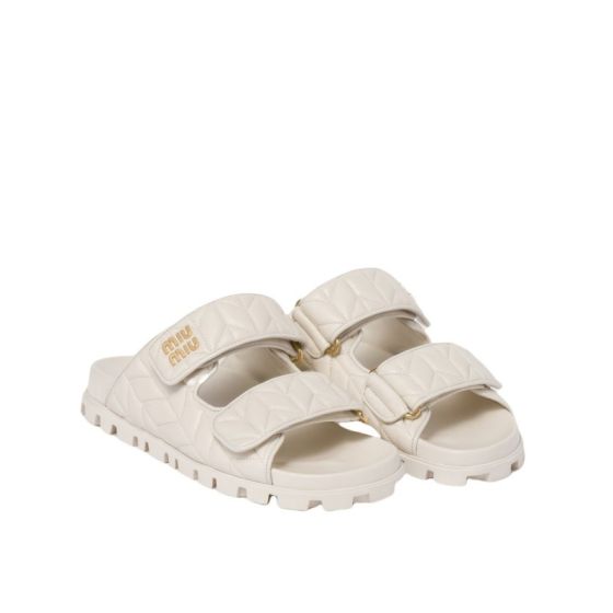 MIU MIU Matelassé nappa leather slides