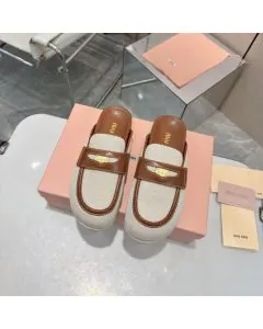 MIU MIU Canvas and leather mules