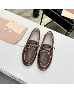MIU MIU Unlined bleached leather boat shoes
