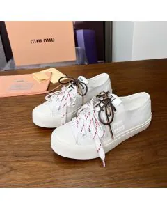 MIU MIU Washed denim sneakers
