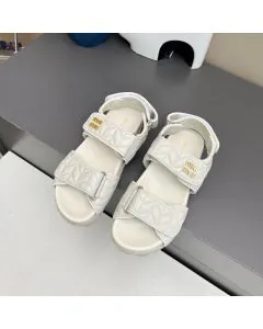 MIU MIU Matelassé nappa leather slides